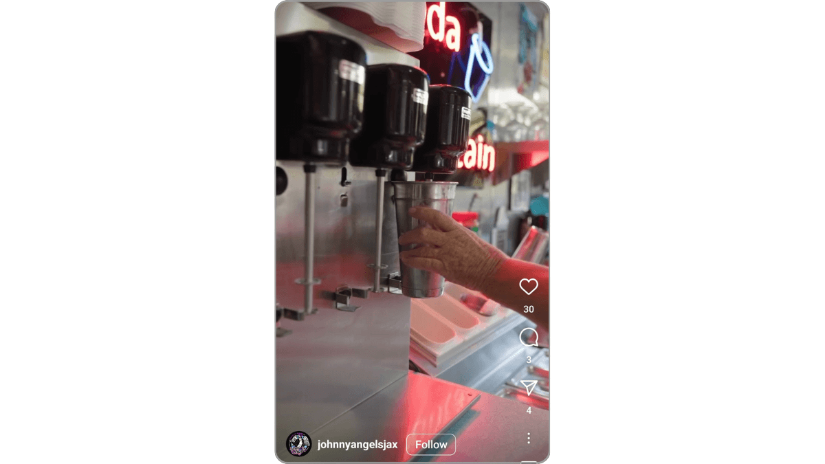 A reel from @johnnyangelsdinerjax shows an employee making a milkshake at the soda fountain.