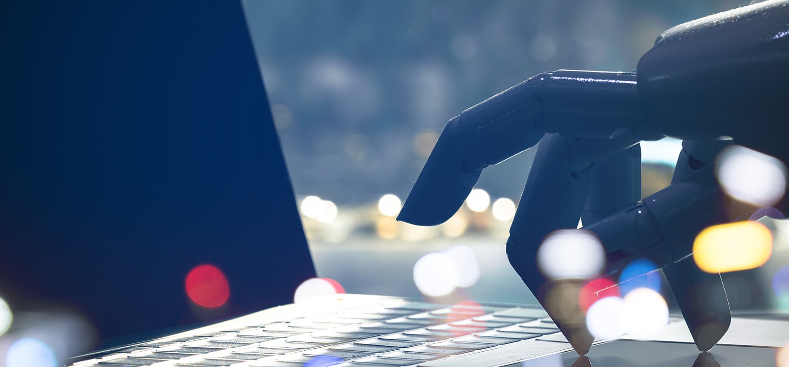 Robot typing on keyboard