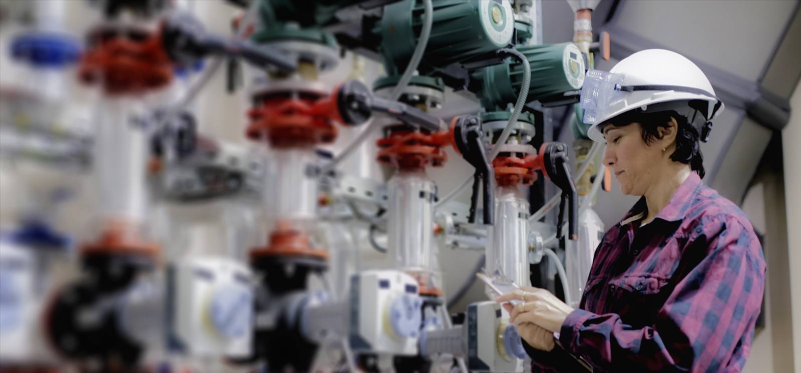 Woman checking utility meters.